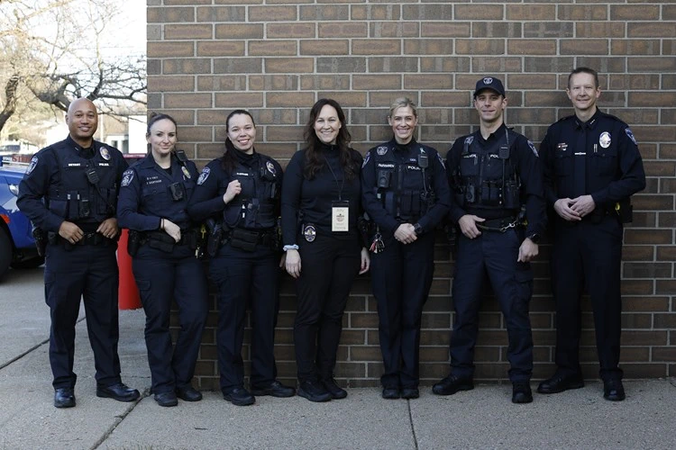Officers posing and smiling